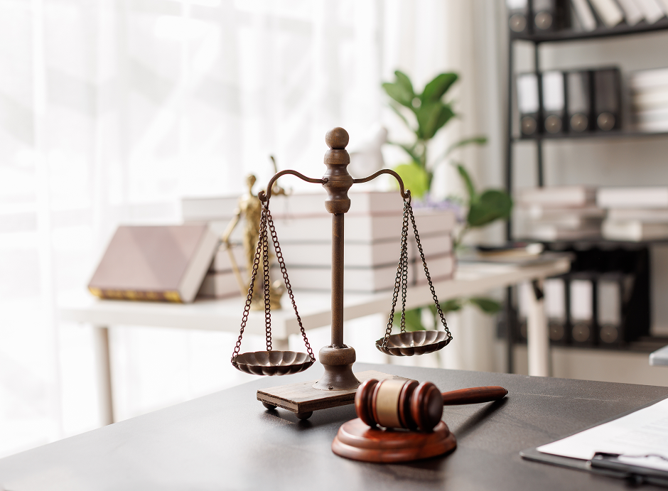 Scales of justice on office desk