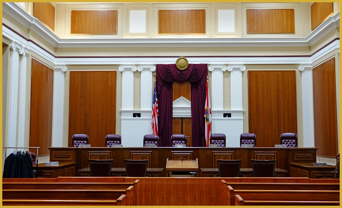 Empty courtroom with wooden benches