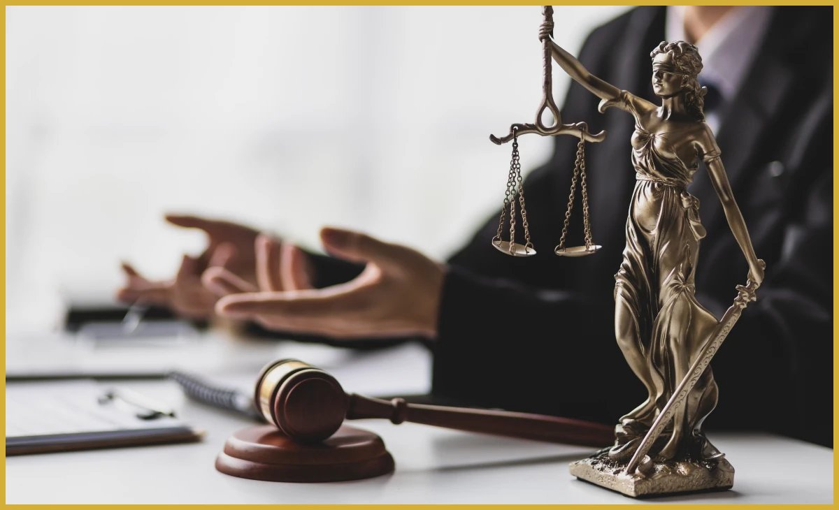Lawyer's desk featuring Lady Justice statue